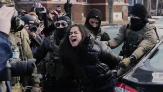 Federal Immigration Agents Filmed Dragging a Woman From Her Car in Minneapolis